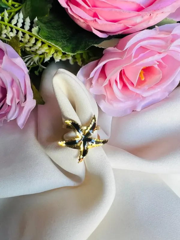 ANILLO ESTRELLA DE MAR NEGRO