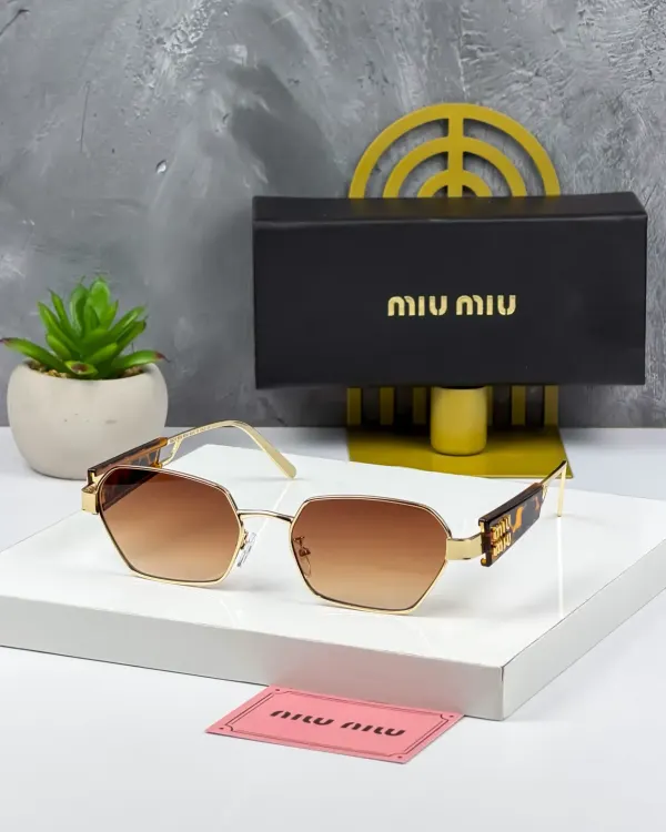 Gafas de Sol MIU MIU Doradas con Lentes Degradados Marrón