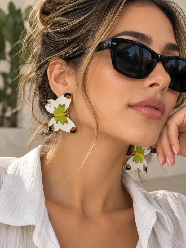 arete en acero mariposa