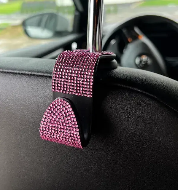 Gancho de cabecera de asiento de vehiculo con brillo rosa