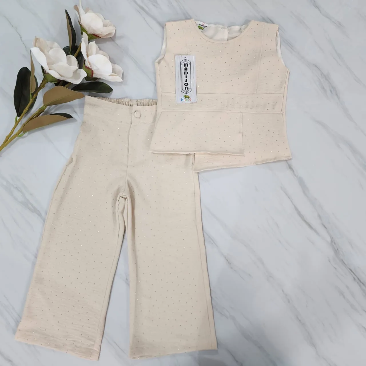 CONJUNTO PEDRERÍA BLUSA ASIMÉTRICA ?