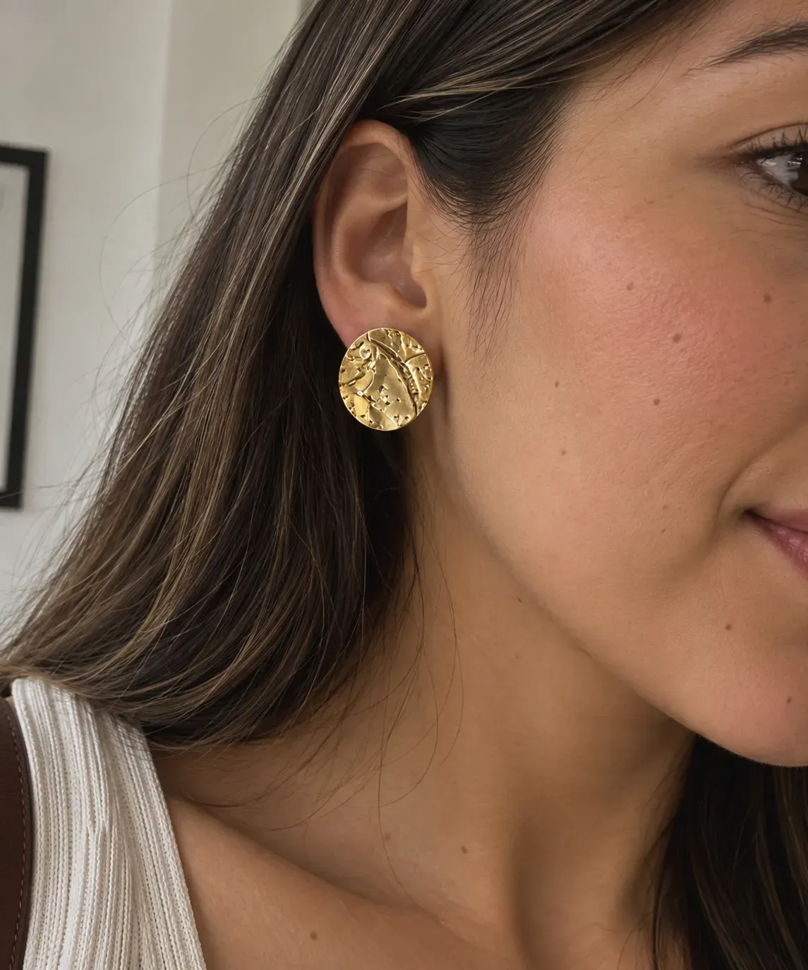 6- Arete moneda