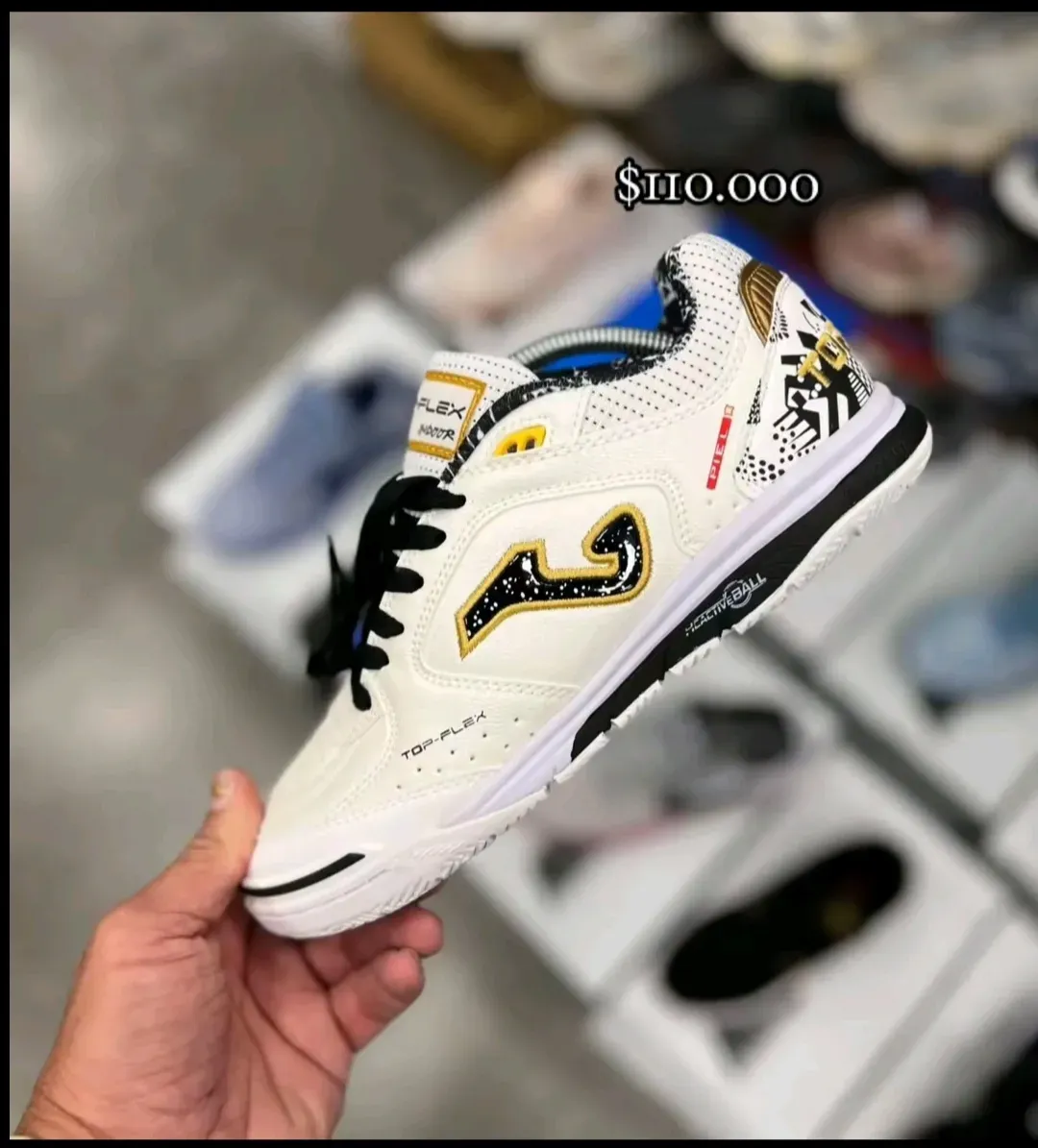 Joma top-flex negro y dorado