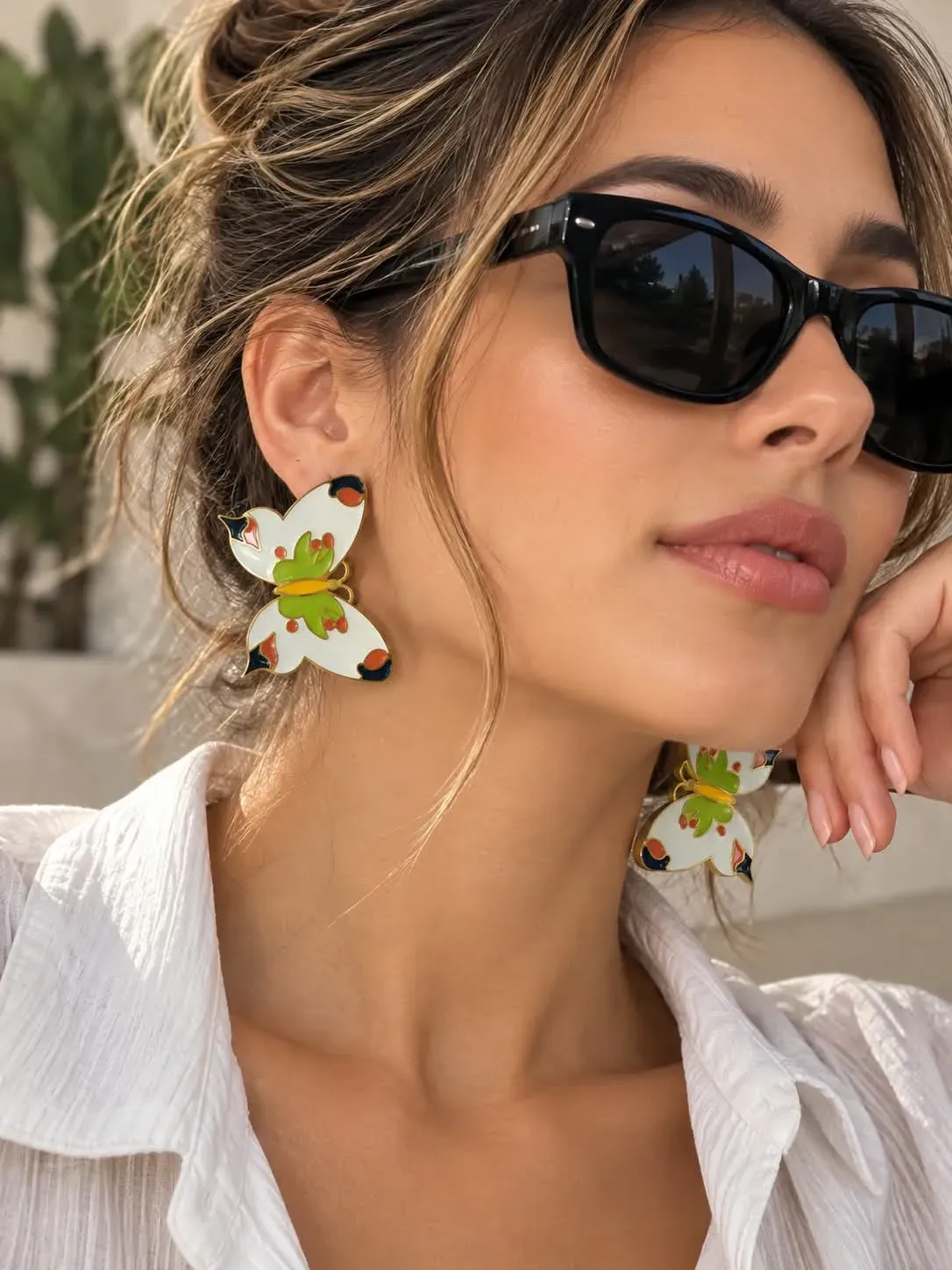 arete en acero mariposa