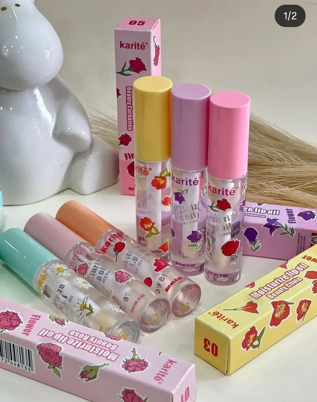 LIP GLOSS KARITE ✨💜💛🩷 (  1 UNIDAD DISPONIBLE) SE ENVÍAN SURTIDOS
